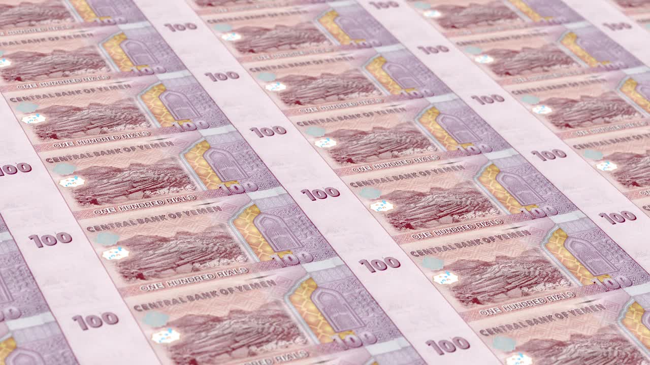 也门里亚尔100钞票印钞厂，印一百也门里亚尔，印刷机印出也门里亚尔，由货币印刷机印钞100也门里亚尔钞票观察和储备侧-无缝循环视频下载