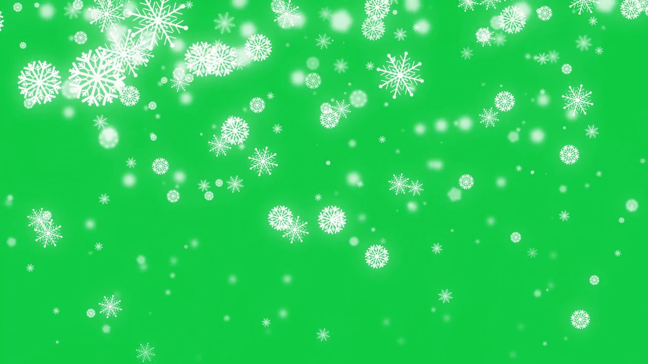 白色的雪花，雪花晶体落在孤立的绿色屏幕背景视频下载