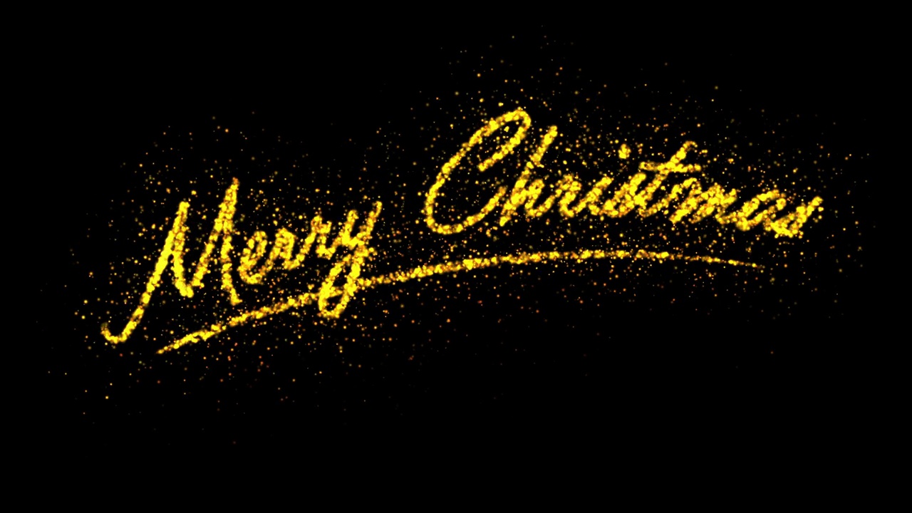 圣诞快乐手写文字与金色闪闪发光的火花。视频下载