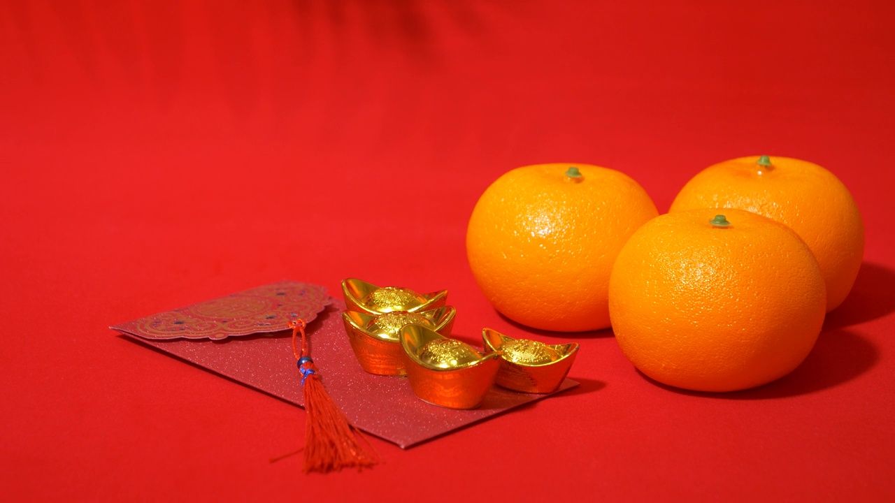 中国农历新年的环红色背景与黄金，橙色，红包视频下载