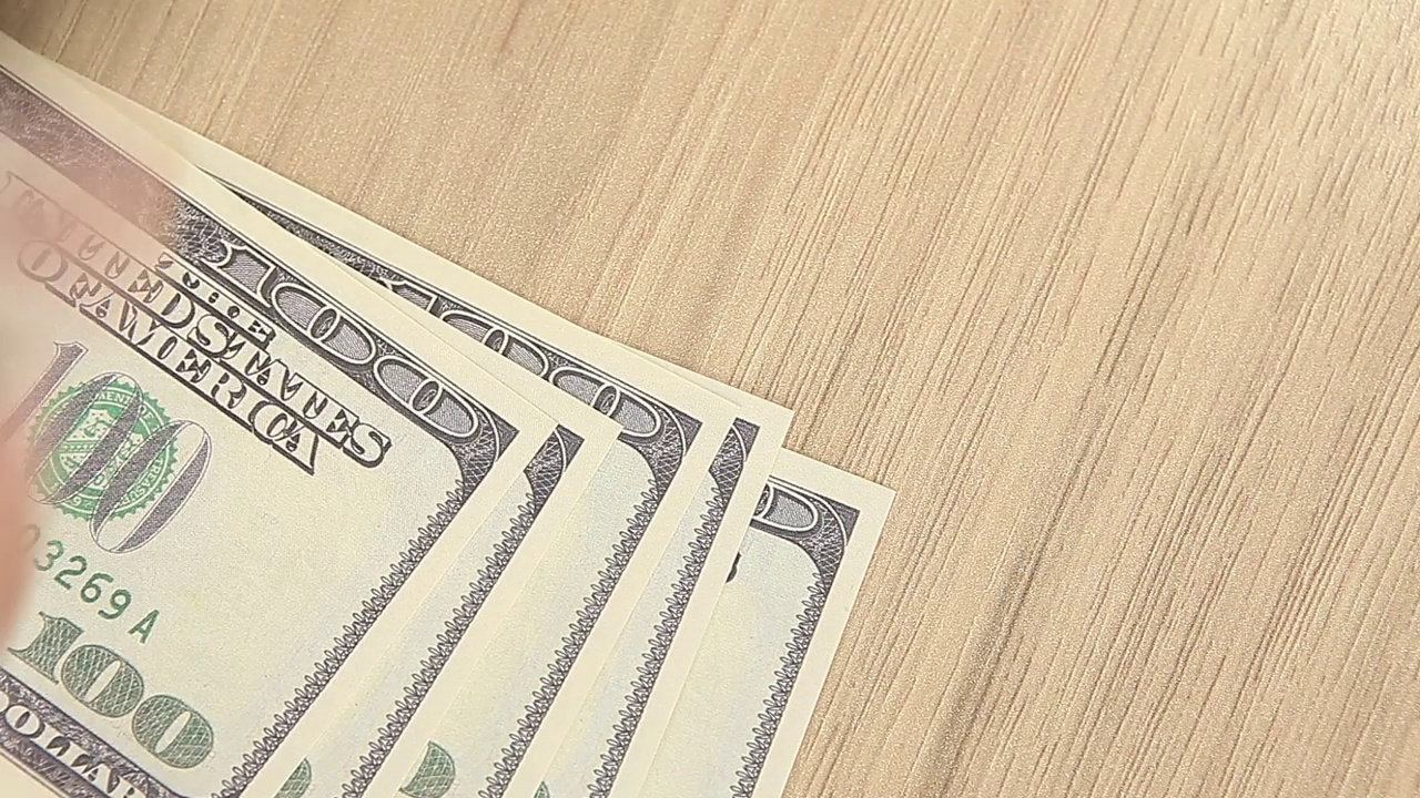 钞票木质桌面背景视频下载