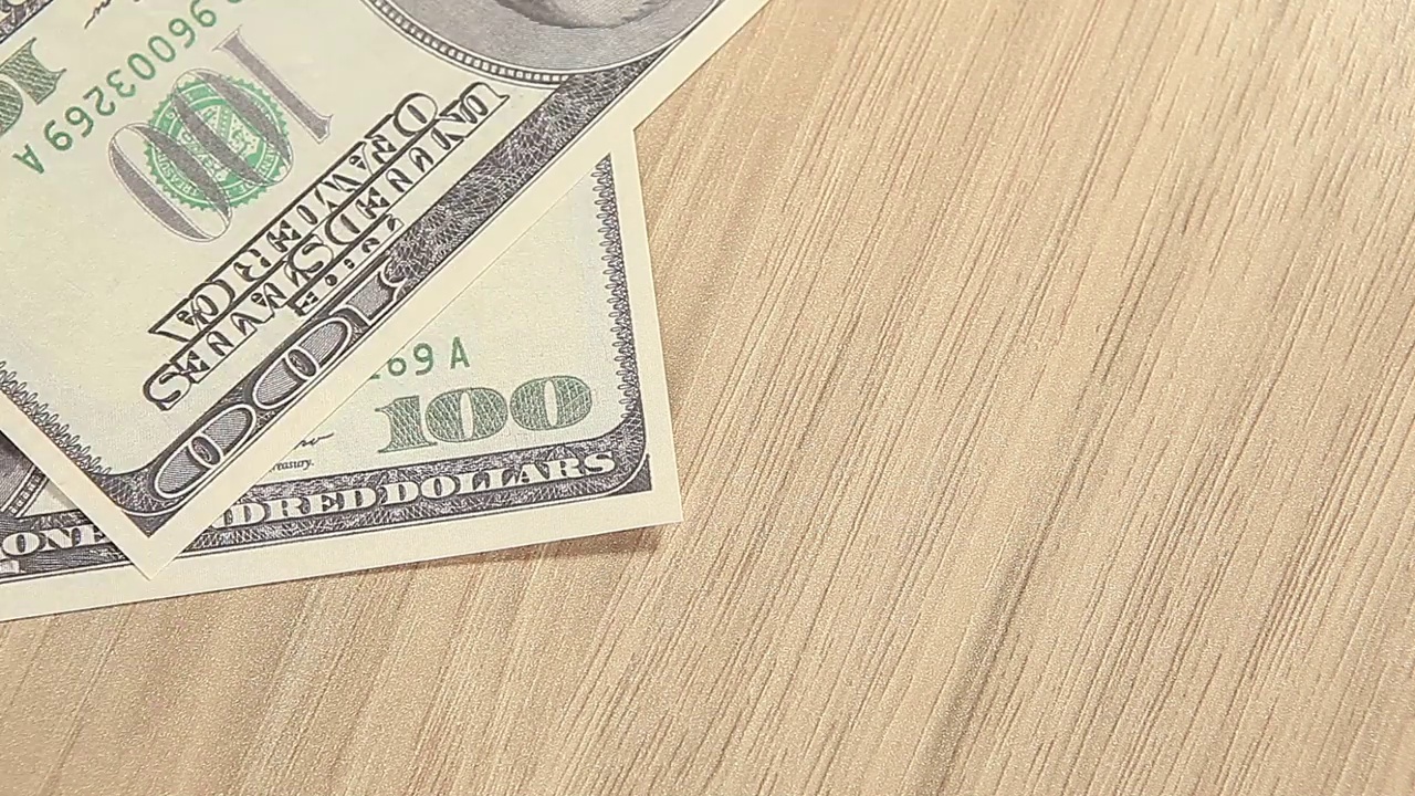 钞票木质桌面背景视频下载