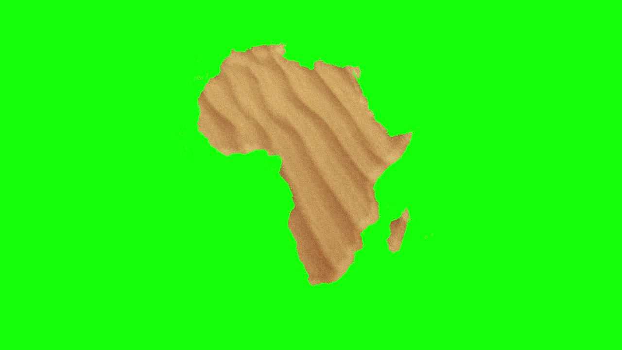 非洲地图上的沙子擦出绿色背景的效果视频下载