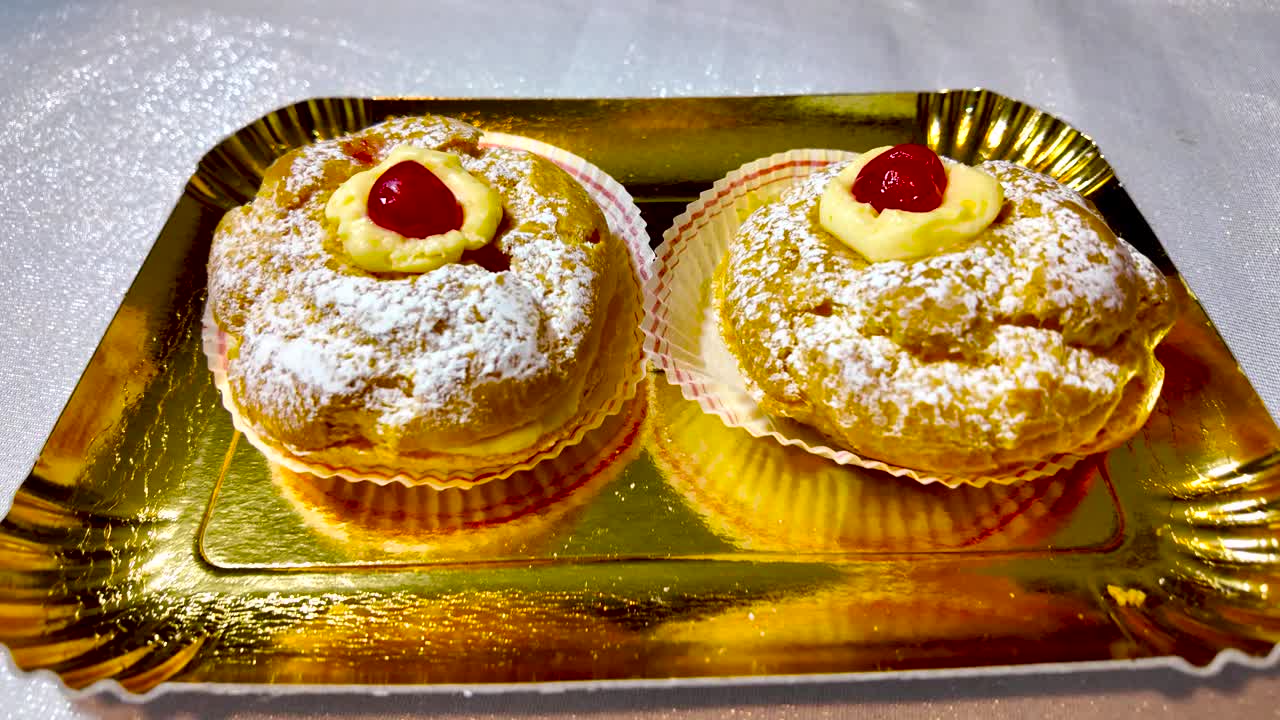 典型的西西里甜点。传统的意大利糕点。金色盘子里的意大利甜点特写视频下载