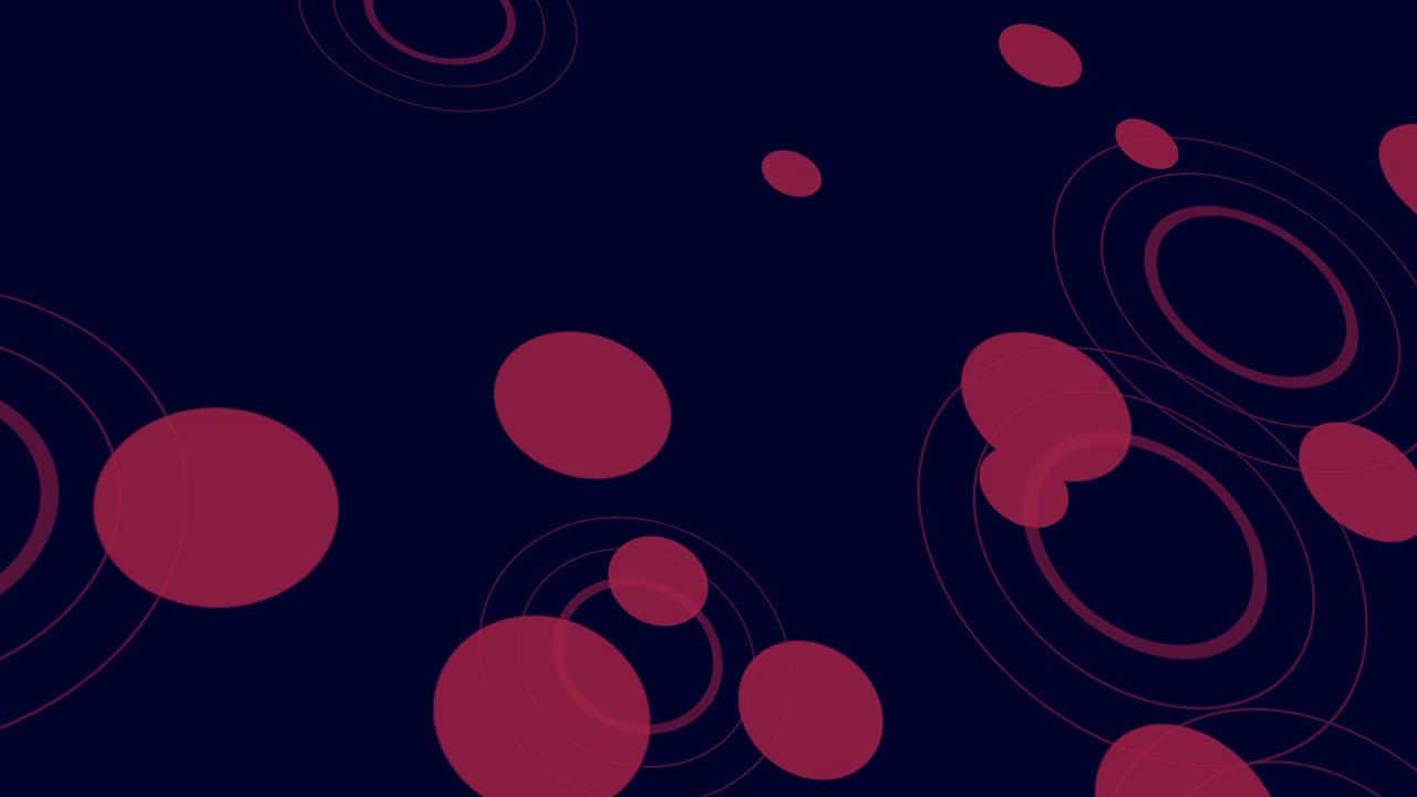 充满活力的红色圆圈照亮了深色画布视频素材