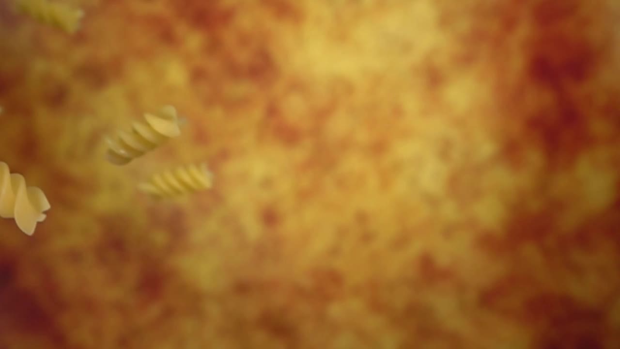 彩色意大利面在黄赭石背景上呈对角线状落下视频下载