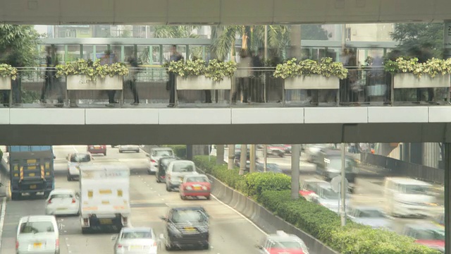 道路交通和行人穿过繁忙的城市十字路口，亚洲，时光流逝视频素材