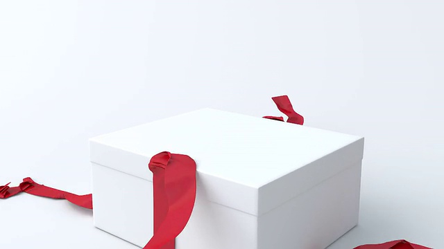 白色，低礼盒与红色丝带开视频素材