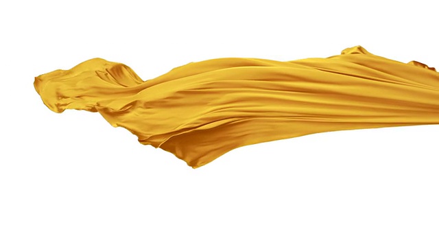 黄色织物在白色背景上流动，慢镜头视频素材