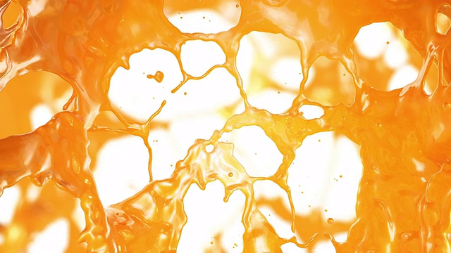 新鲜橙汁流动。超级慢动作。视频素材