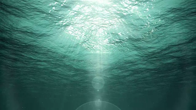 海洋中的水下太阳光(循环)视频素材