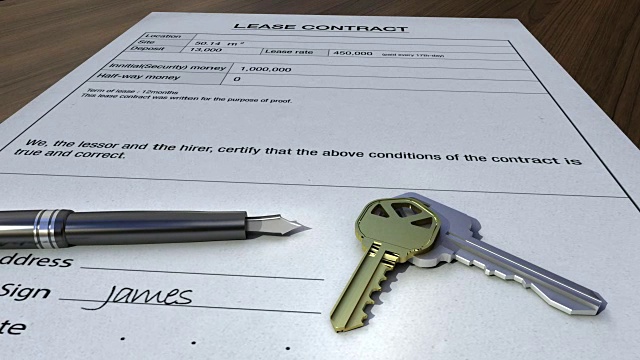 房子钥匙和笔签了合同。视频下载
