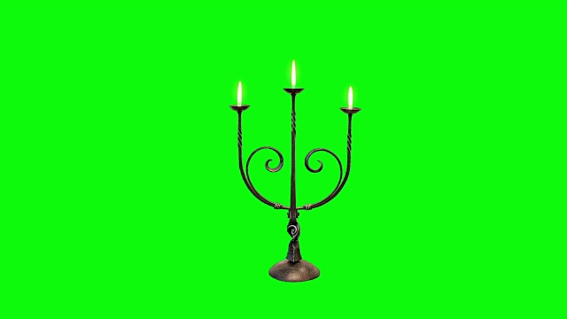 蜡烛与火焰在一个绿色屏幕背景视频素材