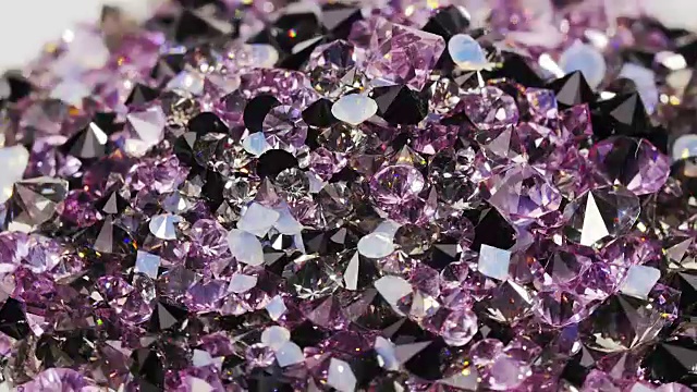 许多暗紫色宝石钻石旋转的背景视频下载