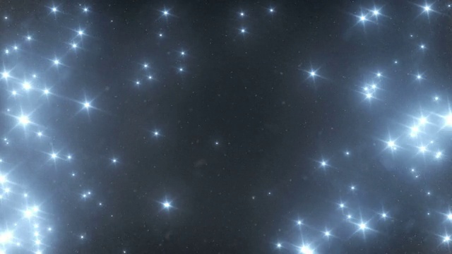 星星和雪花在夜晚从天空飘落视频素材