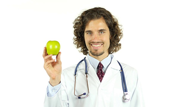 专业医生手里拿着绿苹果视频素材