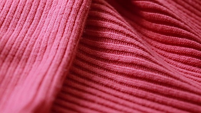 红色羊毛精纺毛衣图案。可以作为背景使用。视频下载