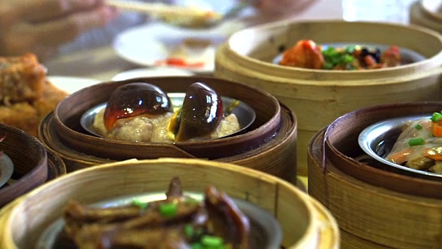 中国传统食物，蒸点心，竹盘美味茶视频购买