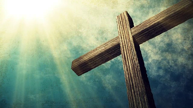 基督的十字架和太阳升起的天空视频下载