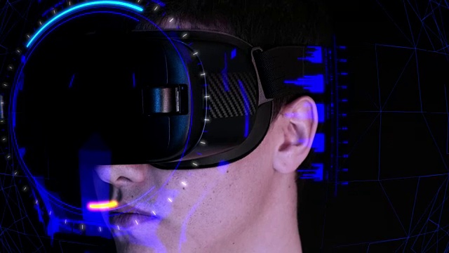 年轻人戴着VR头戴玩虚拟现实游戏视频购买