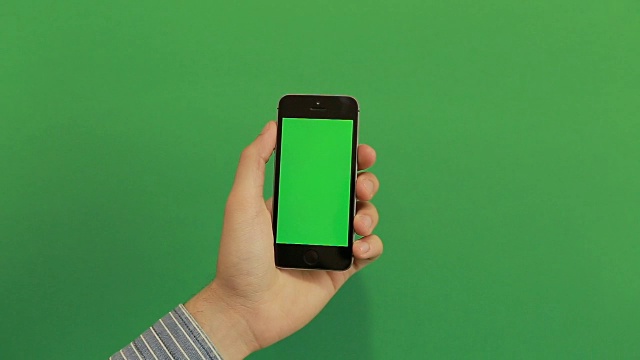 智能手机在绿色屏幕上点击手势视频素材