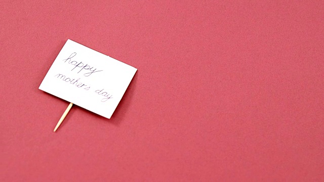粉红色背景的母亲节快乐卡片视频下载