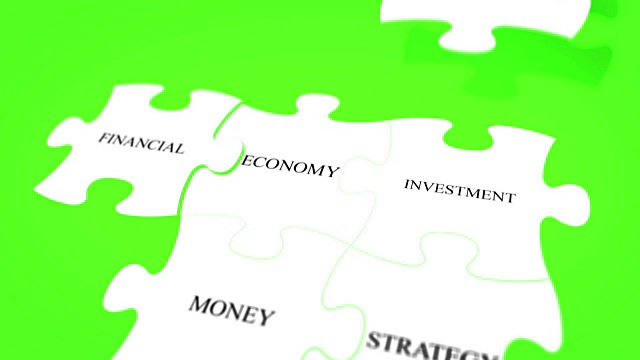 色度键绿屏背景上拼图字财务概念视频素材