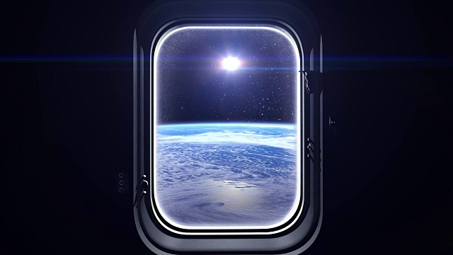 太阳在飞船的窗户上。从太空看到的景象。地球上的日出。太空，地球，轨道，国际空间站，美国宇航局视频下载