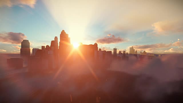 夕阳下的城市天际线，云朵上的飞行视频素材