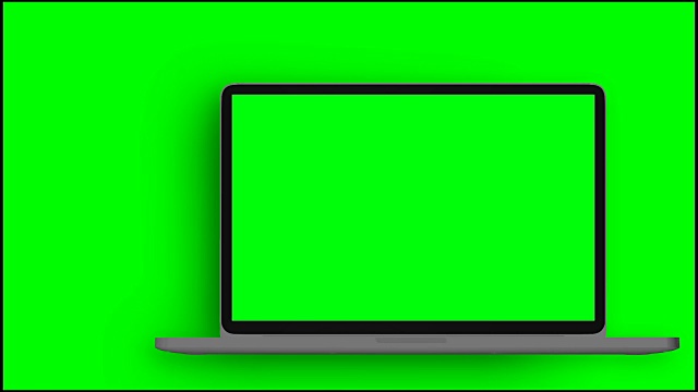 4 k的视频。绿色背景下绿色屏幕的笔记本电脑开机。视频素材