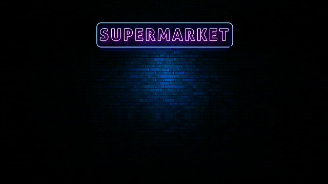 超市霓虹灯招牌在夜晚的墙上闪烁视频下载