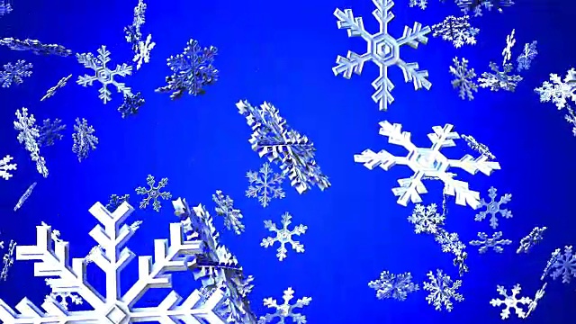 蓝色背景上的雪晶体视频下载