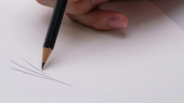艺术家手绘木笔在纸上写就视频下载
