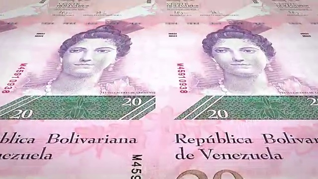 20委内瑞拉玻利瓦尔的钞票在屏幕上滚动，现金，循环视频素材