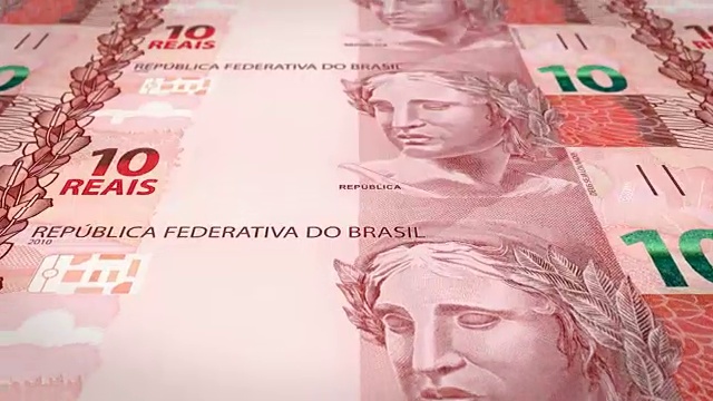 十巴西雷亚尔钞票在屏幕上滚动，现金，循环视频素材