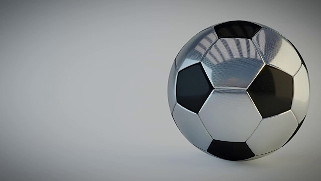 旋转光滑的足球在白色的背景-无缝环视频下载