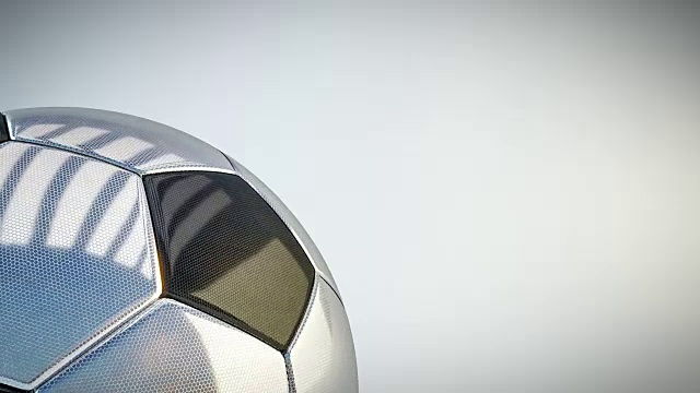 旋转光滑的足球背景-无缝循环视频下载