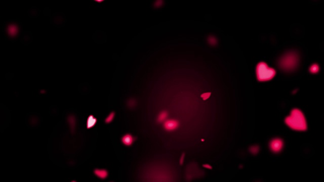 红色缤纷的心飞行动画在黑色的背景，爱和情人节视频素材