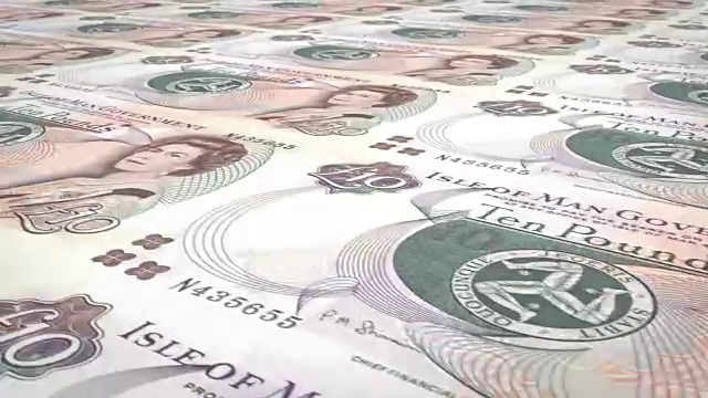 马恩岛10马恩磅的钞票滚动，现金，循环视频下载