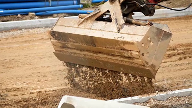 挖掘机抛沙慢动作视频素材