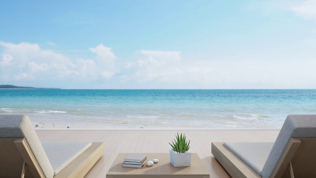 海景平台和床在现代豪华海滩别墅与蓝天背景，躺椅在木制甲板上度假的家或酒店视频素材