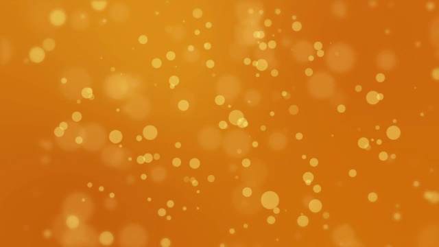 橙色发光的散景背景视频素材
