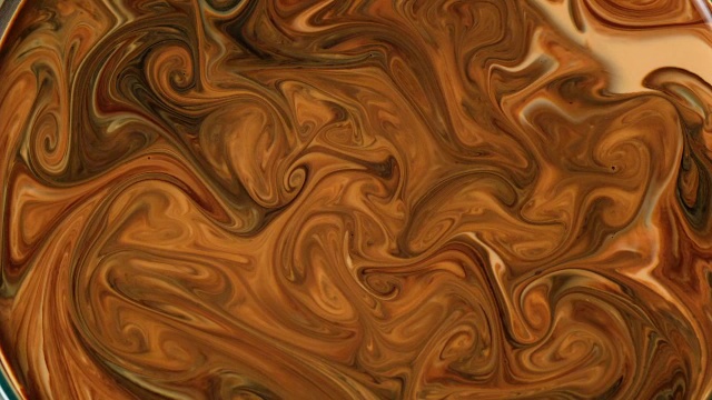 抽象的背景。混合棕色和橙色的液体视频下载