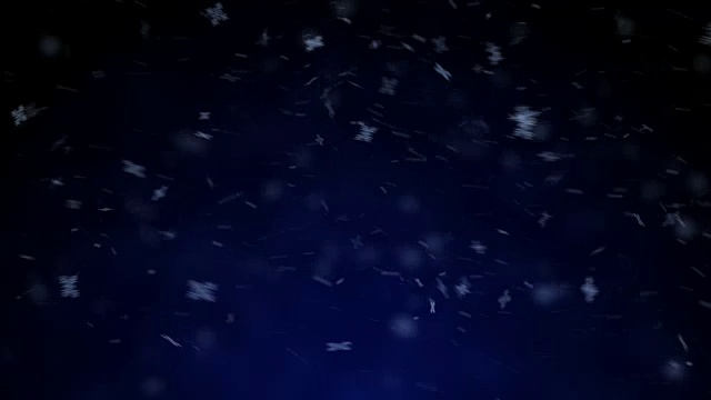 飘落的真正的雪花，大雪，暴风雪天气，拍摄在深蓝色的背景视频下载