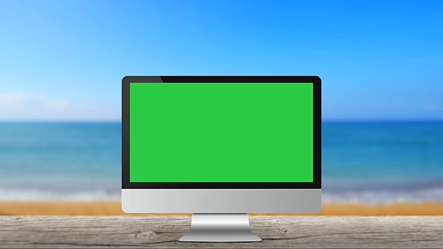 无品牌现代电脑显示器在海滩海背景空白绿色屏幕视频素材