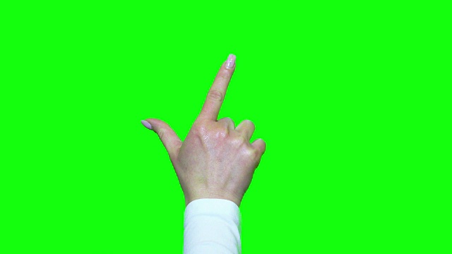 的手势。触摸屏。女性的手在绿色屏幕上显示多点触控手势。UHD股票视频视频下载