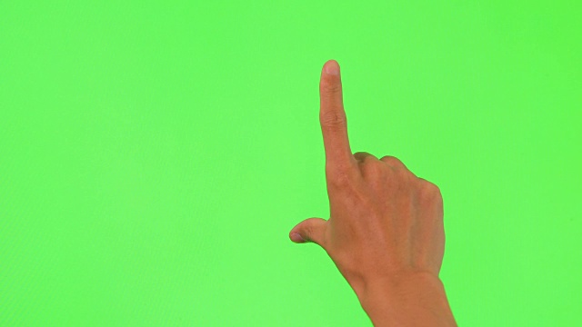 人的手触摸绿色屏幕视频素材