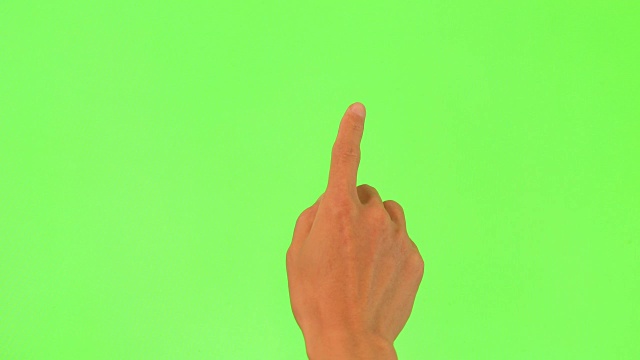 人的手触摸绿色屏幕视频素材