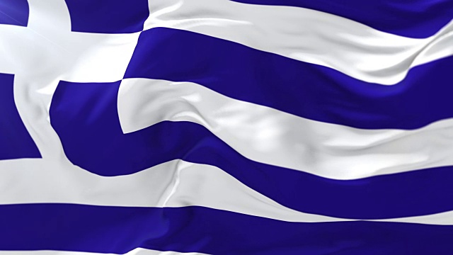希腊国旗随风飘扬，与蓝天相映成趣视频下载
