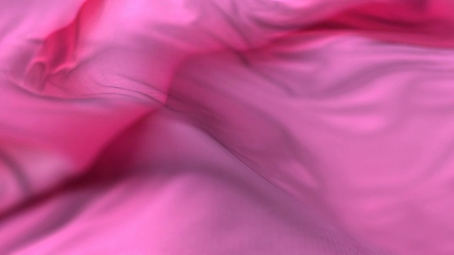在风中缓慢摆动的粉红色布料或丝绸视频素材
